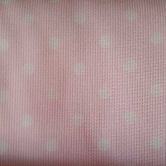 Piquet pois bianco su fondo rosa