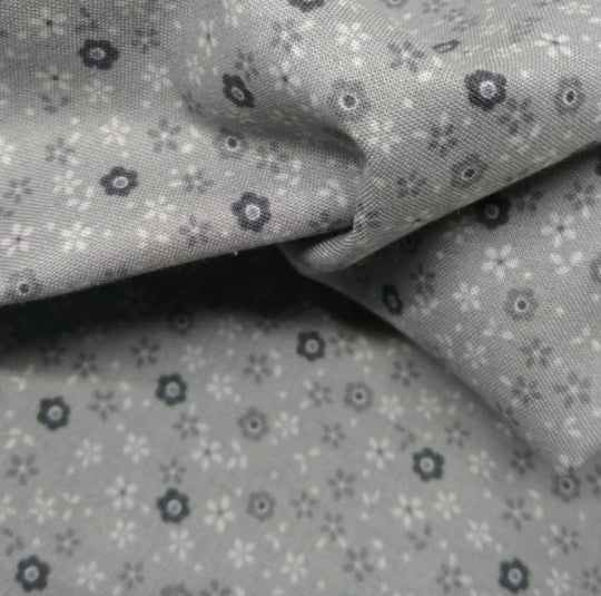 Stof fabrics fiorellini su fondo grigio